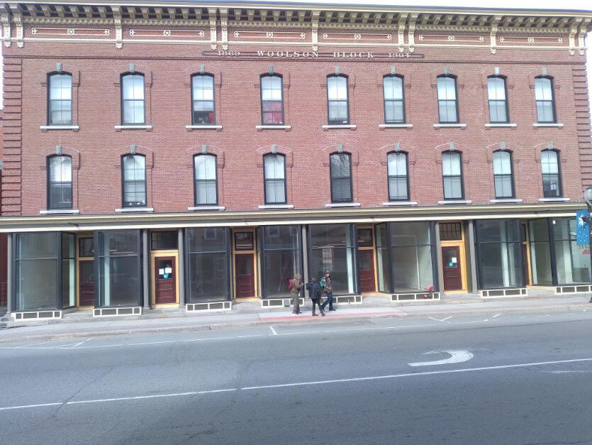 Historic Woolson Block Gets a Masonry Facelift